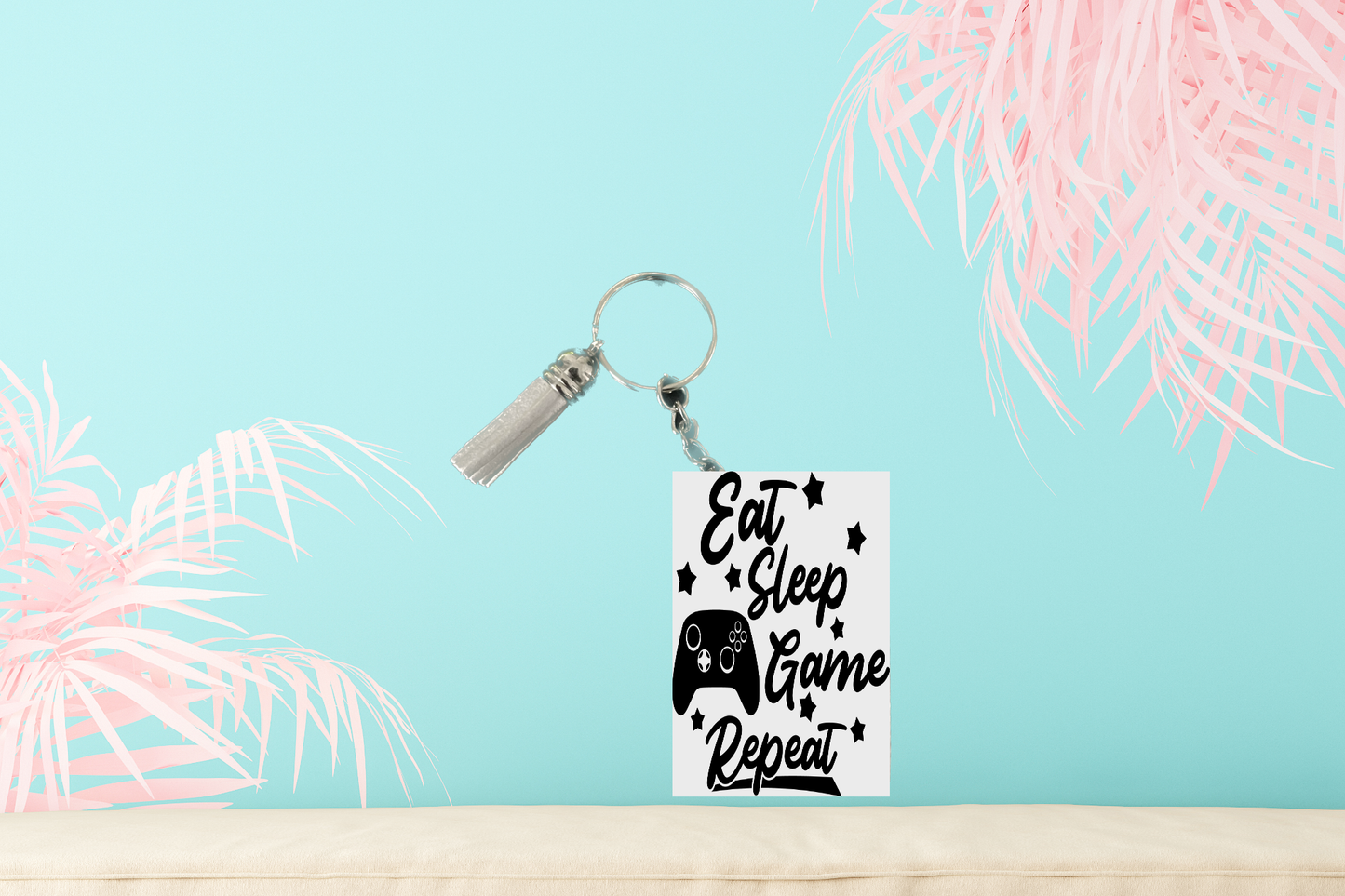 Eat. Sleep. Game. Repeat Keychain